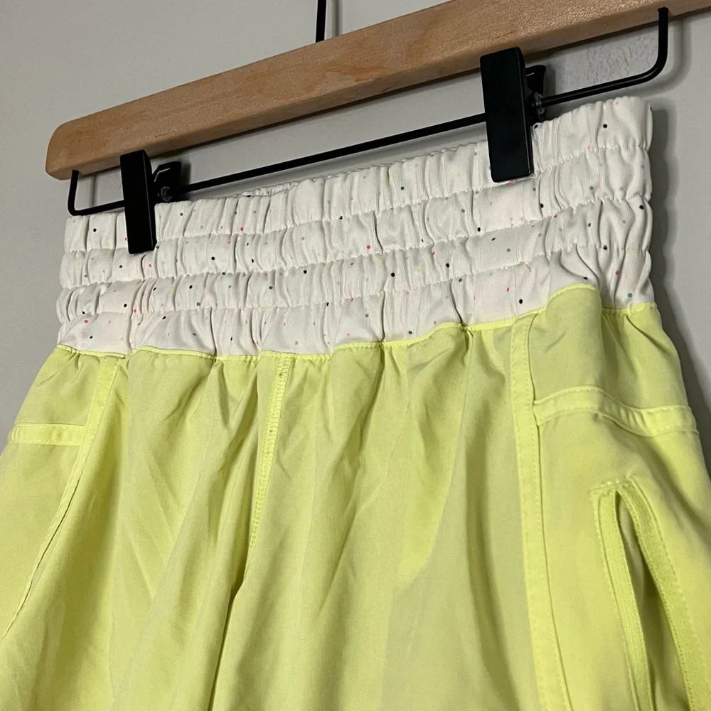 Lululemon Tracker Yellow Shorts with Multicolored Dot patterned waistband